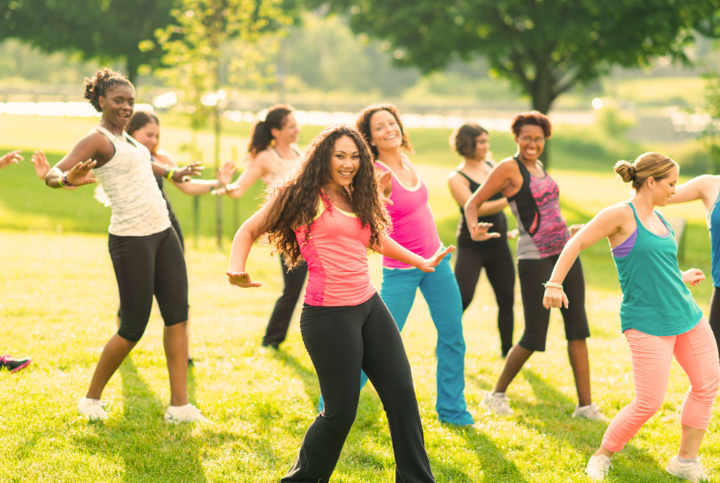 people dancing in a park | Hillsboro chiropractic wellness